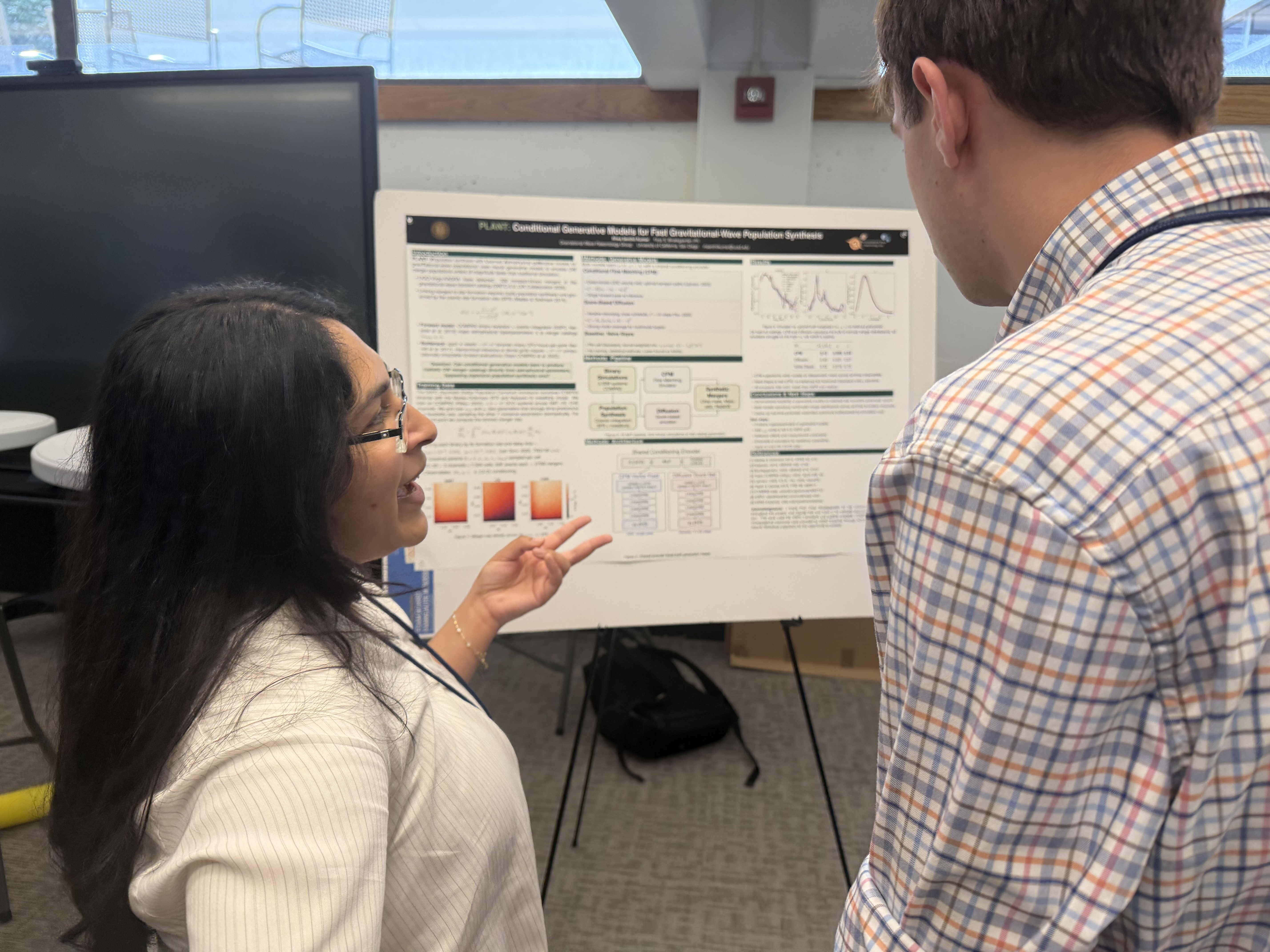 Rhea giving a poster presentation at AstroAI